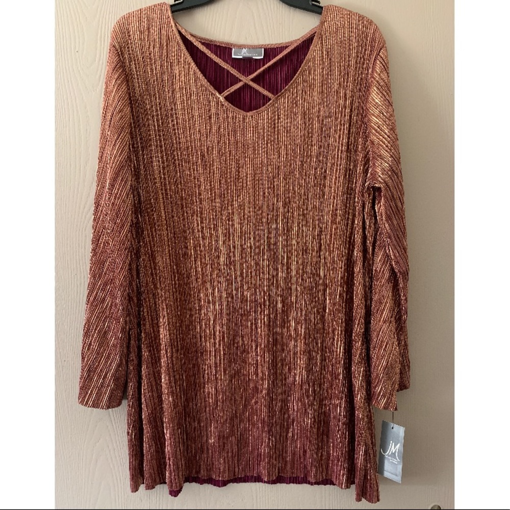 Shimmer bell sleeve top with cutouts.